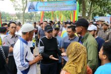H Syamusar saat menghadiri silaturahmi masyarakat di Taman Olahraga Politeknik Caltex Rumbai pada Senin(14/01/2019)/lin