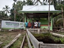 Global wakaf - ACT  melalui program Sumur Wakaf membangun sebuah sumur bor /nof