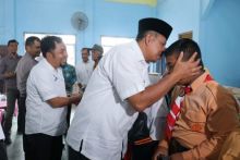 Wabup Alfedri saat menghadiri Musyawarah Kampung Pertanggungjawaban Tahunan (MKPT) Kampung seminai /lin