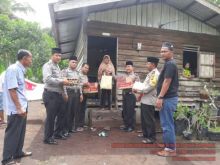 Jajaran Polsek Bengkalis berbagai dengan warga kurang mampu/hari