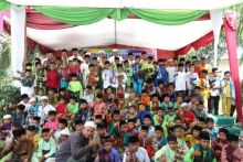 Plt Bupati Siak H Alfedri saat menghadiri khitanan massal dan Harlah Ponpes  Pondok Tahfizh Nurul Furqon/lin