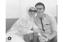 Reino Barack dan Syahrini yang memakai hijab (foto/int) 