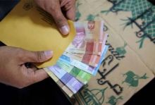 Tips bagi-bagi THR saat mudik (foto/ilustrasi)