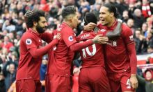 Pemain Liverpool merayakan kemenangan