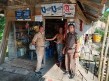 Pemerintah Kecamatan Pusako Kabupaten Siak bersama Satpol PP Pusako melakukan teguran tertulis/lin