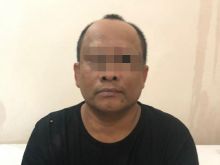 Foto Tersangka mantan Kades Berinisial MI. Foto. Istimewa