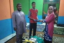 Pemkab Bengkalis menyerahkan bantuan ke Panti Asuhan  yang mengalami musibah kebakaran/hari