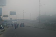 Kabut asap pekat menyelimuti Kota Pekanbaru, Riau