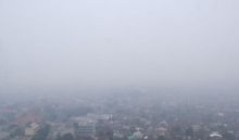 Kabut asap menghilangkan Kota Pekanbaru pagi ini (foto/amri)