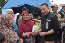 Bupati Kampar H. Catur Sugeng Susanto, SH kembali melakukan peninjauan Banjir.