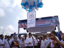 Walikota Pekanbaru, Firdaus saat membuka acara Bulan Bakti LPM Kota Pekanbaru di halaman Rumah Tuan Kadi Senapelan, Rabu (18/12/2019). (R24/put)