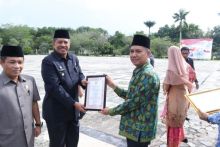 Bupati Siak H Alfedri menjadi Pembina Upacara dalam rangka Peringatan  Hari Ibu (PHI) ke 91 yang digabung dengan Peringatan Bela Negara ke 71 (foto/lin)