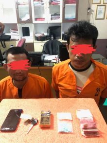 Polres Indragiri Hilir (Inhil) menangkap dua orang laki-laki warga Tembilahan, terkait tindak pidana narkotika (foto/Rgo)