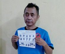 Foto Sekjen Sunda Empire kenakan baju tahanan (foto/int)