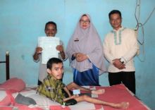 Kepala Disdukcapil Kota Pekanbaru, Irma Novrita setelah melakukan perekaman Data e-KTP salah seorang warga penyandang disabilitas, Jumat (31/01)