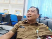 Kepala Dinas Perikanan Bengkalis Herliawan (foto/int)