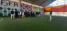 Asisten Ekonomi dan Pembangunan Setda Kab Siak Hendrisan secara resmi membuka Turnamen Futsal (foto/Lin)