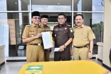 Pemerintah Kabupaten Indragiri Hilir menggandeng Kejaksaan Negeri Tembilahan dalam upaya mengembalikan aset Pemerintah Kabupaten Indragiri Hilir sesuai dengan catatan dari Badan Pengawas Keuangan (foto/Rgo)