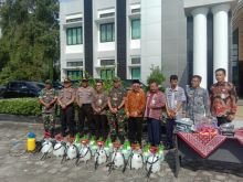 Dipimpin Pelaksana Harian Bupati Bengkalis H. Bustami HY. Dinas kesehatan Bengkalis melaksanakan apel siaga darurat Corona (foto/Hari)