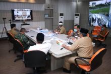 Bupati Siak Alfedri didampingi pimpinan Forkopimda Kabupaten Siak melaporkan sejumlah langkah penanganan merebaknya penyebaran wabah Covid 19 (foto/Lin)