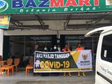 Badan Amil Zakat Nasional (Baznas) Kabupaten Pelalawan, menurunkan relawan Baznas Tanggap Bencana (BTB) melakukan sterilisasi beberapa lokasi dari Covid 19 (foto/Ardi)