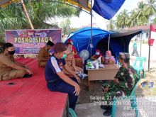 Sosialisasi dan pengetahuan mengenai virus corona atau Covid-19 terus dilakukan tim gabungan Covid-19 (foto/int)