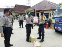 Bhabinkamtibmas siap menyalurkan Bantuan Kemanusiaan oleh Polres Rohil ke masyarakat (foto/int)