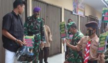 Tim Gugus Tugas Razia Masyarakat Tak Pakai Masker di Pasar Kayu Jati, Tembilahan Hulu (foto/Rgo)