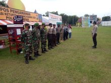 Anggota Koramil 01/Bkn Lakukan Pemgamanan Pos Pam Covid-19 di lapangan Merdeka