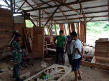 Sosialisaikan Bahaya Covid-19, Prajurit TNI Ini Gelar Komsos