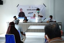 Bupati Alfedri Salurkan 170 Paket Bantuan Pangan Olahan Ikan di Kampung Tualang (foto/int)