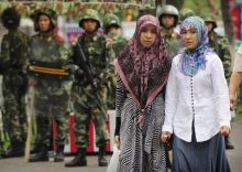 Wanita Uighur hidup dalam bayangan ketakutan