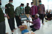 Baznas Siak Salurkan Zakat Tahap V Tahun 2020 Rp 3,4 Milyar, Bupati Alfedri Ingatkan Masyarakat Bayar Zakat Ke Baznas (foto/int)