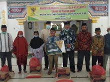 Baznas Siak Salurkan Bantuan Warga Koto Gasib Terdampak Covid-19 (foto/int)
