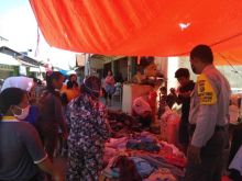 Polsek Langgam Gelar Polri patroli C3 dan Sosialisasi Antisipasi Penyebaran Covid-19 di Desa Segati