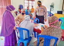 Tingkatkan Pelayanan Kepada Masyarakat, Polsek Kerumutan Kawal Program Disdukcapil di Desa Bukit lembah subur