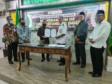 Penandatanganan MoU antara UIR dan BRK