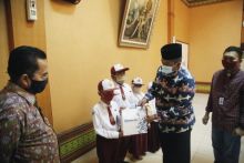 Bupati Salurkan Beasiswa Pendidikan BRI Cabang Siak (foto/ist)