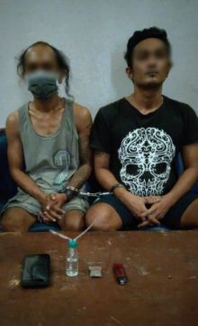 Dua tersangka 