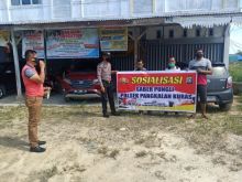 Polsek Pangkalan Kuras Lakukan Sosialisasi Saber Pungli Kepada Penjaga Parkir Pasar Baru Kelurahan Sorek Satu