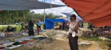 Bhabinkamtibmas Turun ke Pasar, Himbau Warga Patuhi Protokol Kesehatan