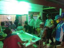 Gandeng Upika, Polsek Kerumutan Gelar Kegiatan Pendisiplinan Masyarakat di Masa Pandemi Covid-19