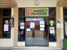 4 Pegawai Disdukcapil Pelalawan Positif Covid-19, Pelayanan Administrasi Kependudukan Dihentikan (foto/ardi)