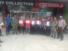 Sosialisasikan Protokol Kesehatan, Polsek Pangkalan Kuras Lakukan Pemasangan Banner Maklumat Kapolri