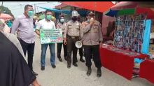 Kapolsek Bandar Sei Kijang Imbau Pengunjung Pasar Patuhi Protokol Kesehatan