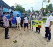 Antisipasi Penyebaran Covid-19, Personil Polsek Bunut Terus Galakkan Sosialisasi Covid-19