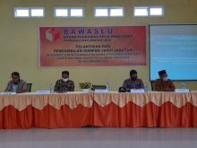 Kapolsek Ukui Hadiri Pelantikan Pengawas Tempat Pemungutan Suara Pilkada Serentak