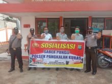 Polsek Pangkalan Kuras Lakukan Sosialisasi Saber Pungli di Kantor Pos Sorek Satu