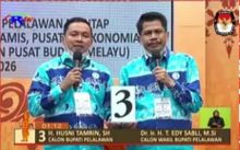 Pasangan Cabup dan Cawabup Pelalawan Husni Tamrin dan T Edi Sabli