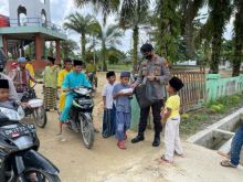 Polsek Langgam Gelar Giat Rutin Jumat Barokah di Masjid Al Muhajirin
